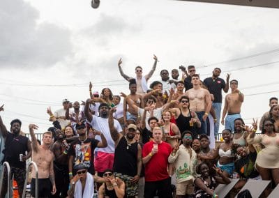 Group photo from rooftop Okinawa pool party